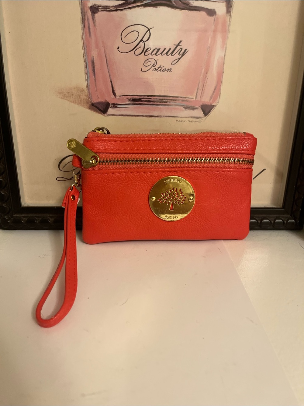 Mulberry Coral Leather Zip Pouch Wristlet with Gold Medallion